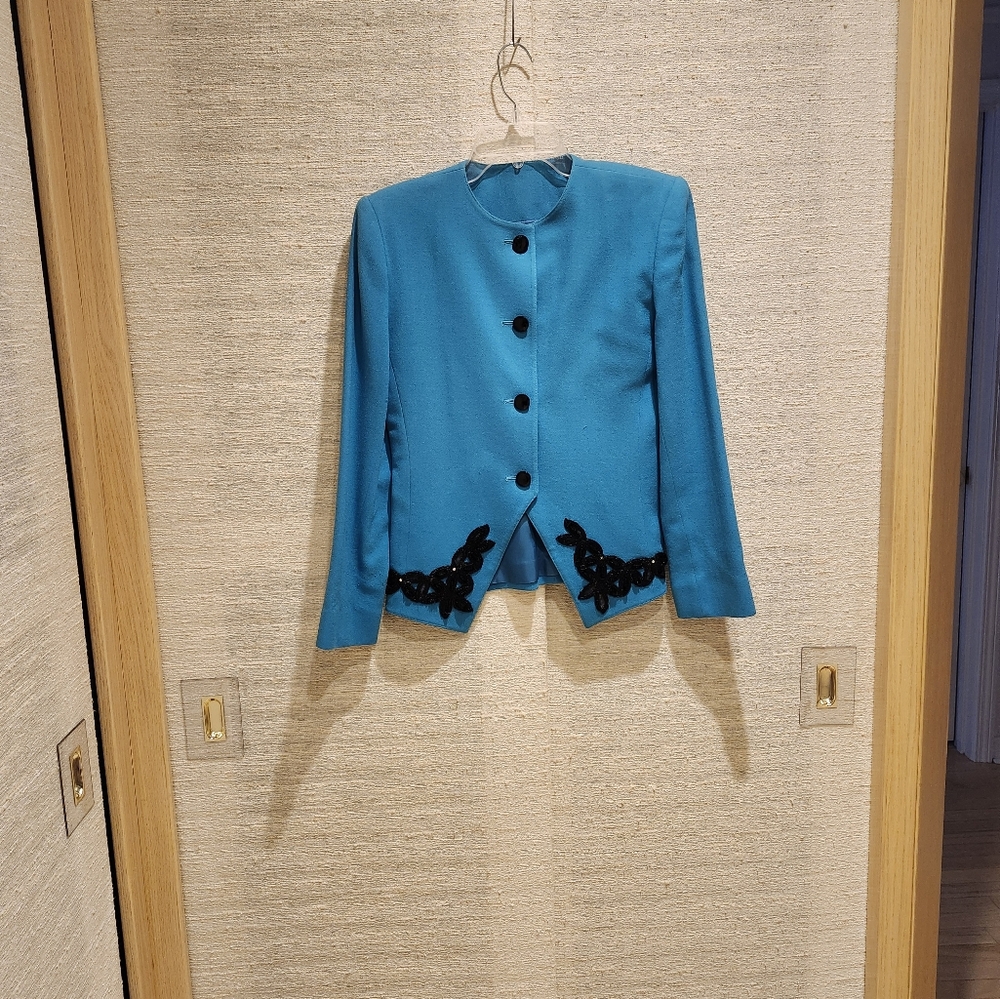 Vintage designer's model Robin egg blue jacket with black plisset skirt. Size 4